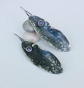 handmade silver earrings in leaf design with popular small amethyst stones