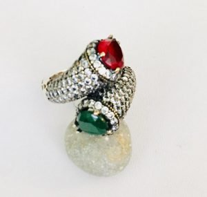 vintage ring made of emerald and topaz