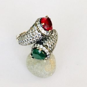 vintage ring made of emerald and topaz