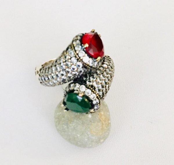 vintage ring made of emerald and topaz