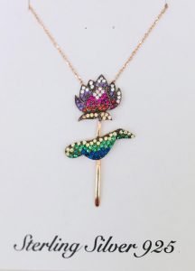 sterling silver 925 necklace with chain hanging on the wall