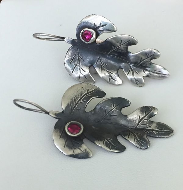 ruby stones earrings curved leaf design