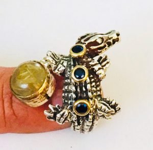 crocodile ring on the finger