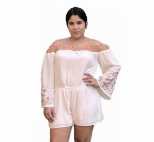 young girl with cute ivory color romper