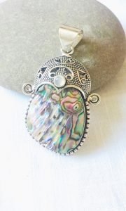 silver pendant height 2.5 inches X width: 2.5 inches. or 6 x 4 centimeters