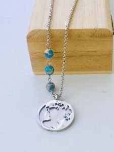 globe medallion with Turquoise Pearl