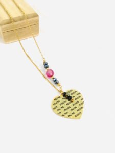 a heart necklace gold color