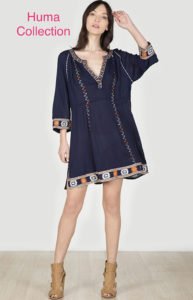 a woman wearing an ethnic short dress