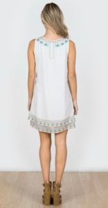 staying back girl wearing a short dress