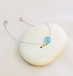 blue opal bracelet on the cream color stone