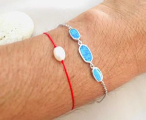 three stones bracelet in a woman's wrist