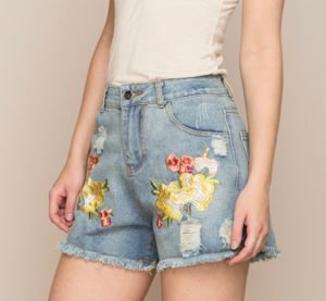 a youn girl wearing a short denim jeans