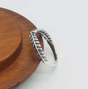 solid silver ring on the wood