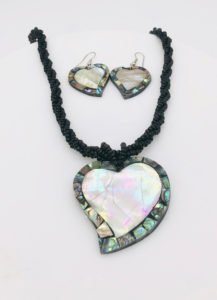 abalone shell stone made set in white background