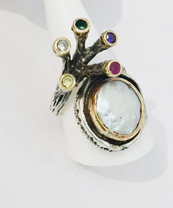 a multi gemtsone ring for ladies