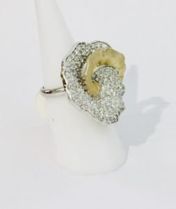 silver made floral designed ring