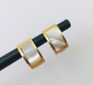 gold color hoop earrings mother of pearl in a stick