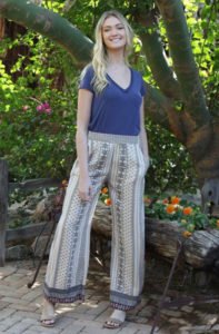 blonde model wearing ethnic print wide leg trousers in