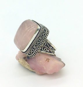 displaying side view of a square cabochon silver ring