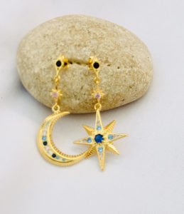 a gold star shape sterling silver tear earrings