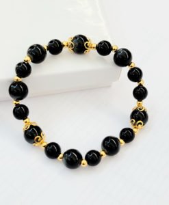 a black faceted bracelet