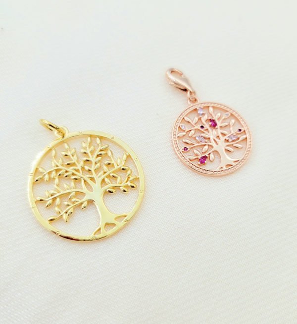 two pairs of charm pendant displaying