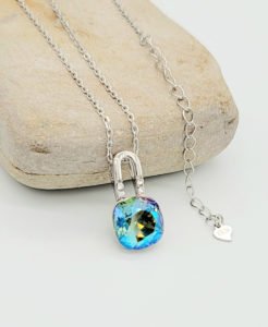 blue lock necklace with chain on the stone