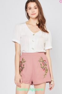 girl wears mauve shorts