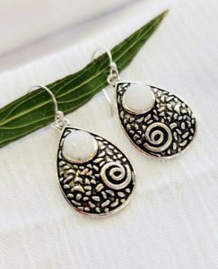 earrings made in moon stone