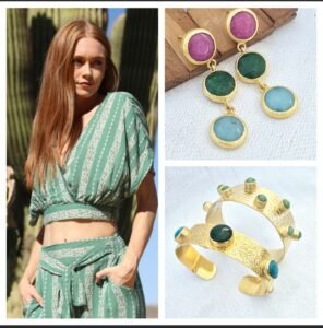 woman wearing a top, pant , gold plated earrings,bracelet combined embbeded with natural stones